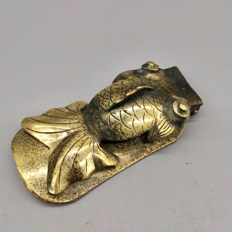 

Brass shoe puller, portable goldfish longevity star, brass shoe wearing device, small-sized household shoes, skate handle