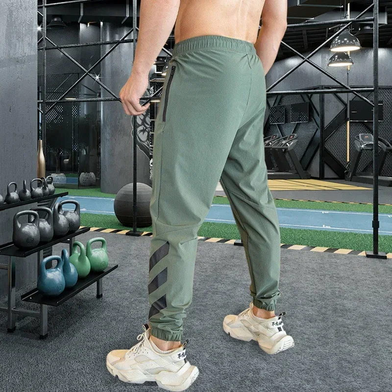 Men Gym Fitness Sports Running Trousers Outdoor Workout Jogging Sweatpants Dry Fit Leggings Zipper Pockets Long Pants sports sweatpants