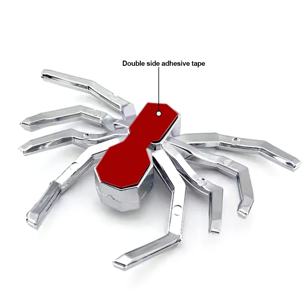 installing a 3D spider emblem sticker on a vehicle