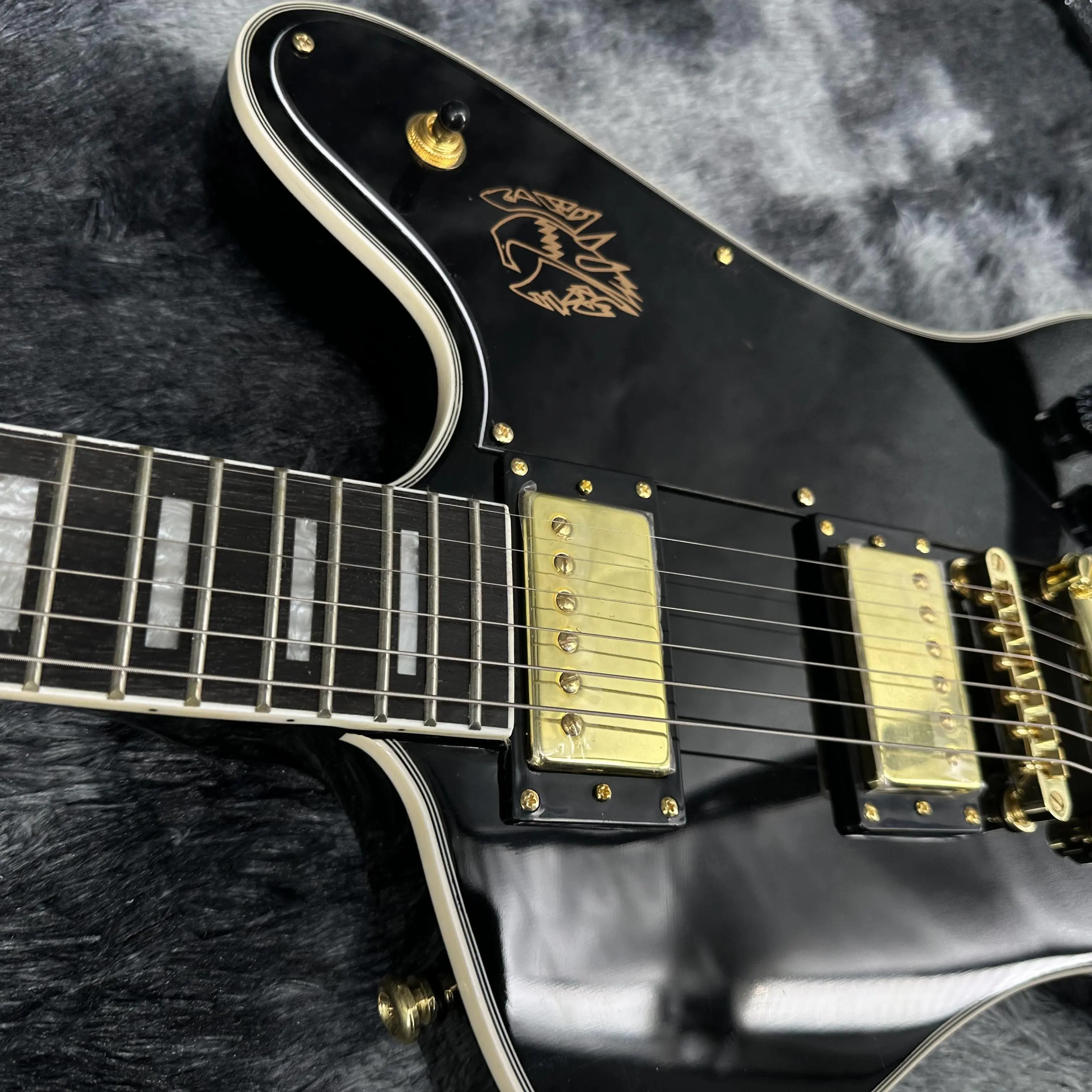 Firebird Black Electric Guitar with Electric Gold Accessories