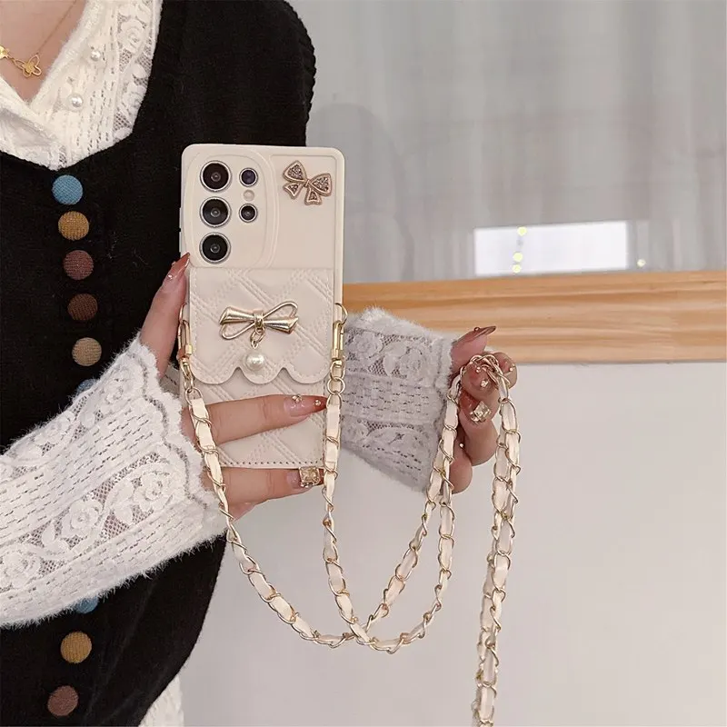 Pearl Bow Chain Wallet Phone Case with Elegant Design