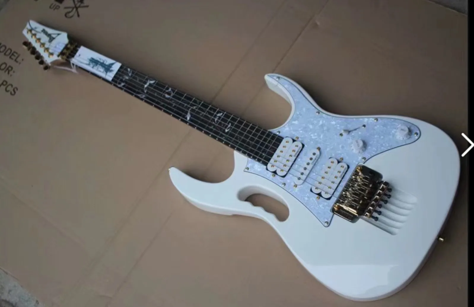 

6-string electric guitar, rose wood fingerboard, gold parts, white paint, customizable color, including shipping cost