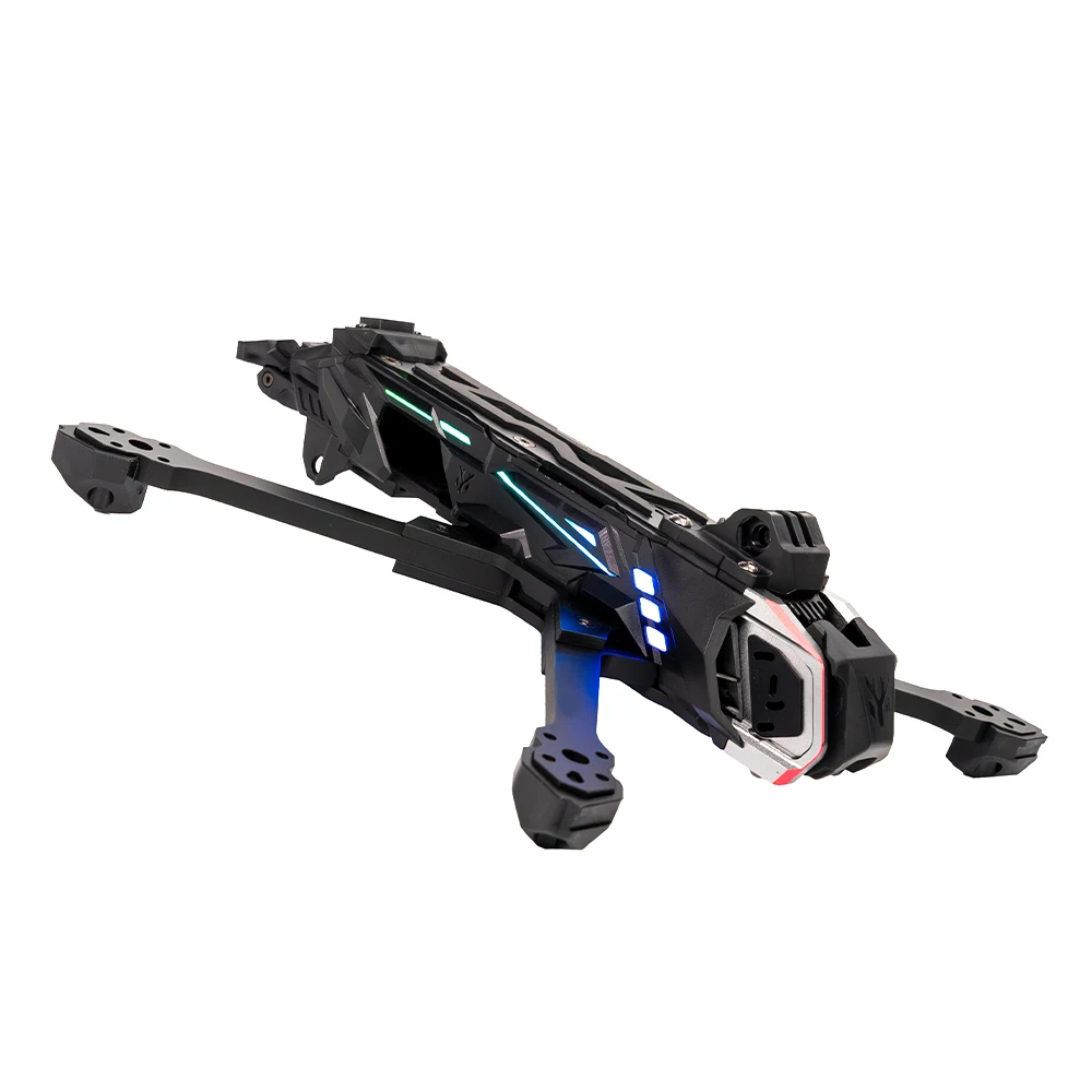 Châssis Nblade MAX pour drone FPV 5 pouces posé sur fond noir, éclairage RGB multicolore visible.