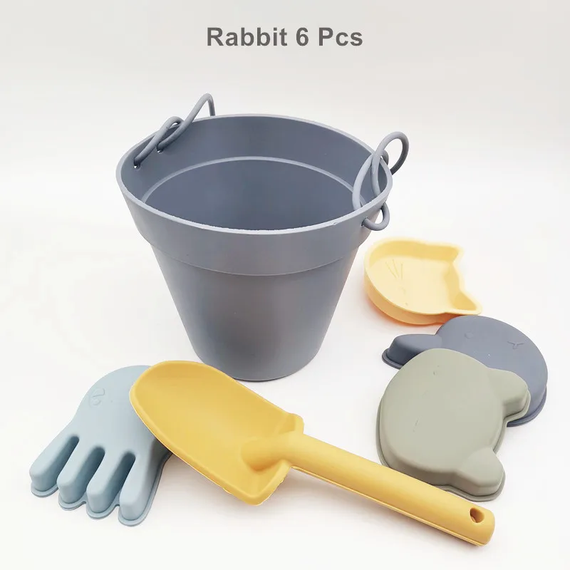 Set di giochi da spiaggia in silicone per bambini con secchiello_voghion.com