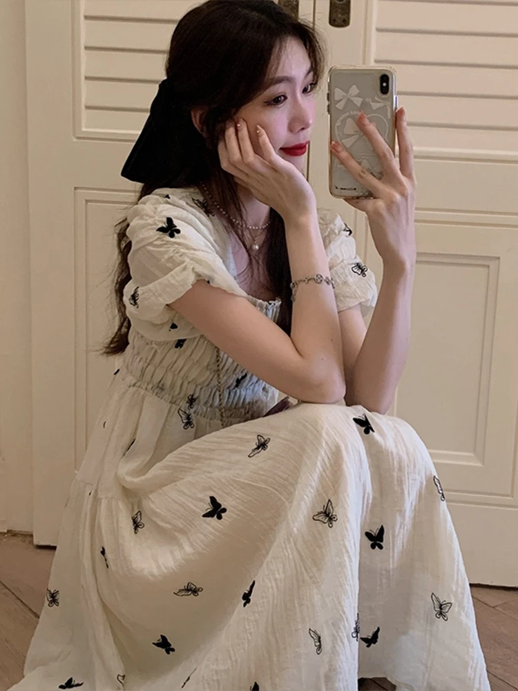 

Bubble sleeve square neck floral dress for children's summer 2024 new French high-end temperament seaside vacation long dress