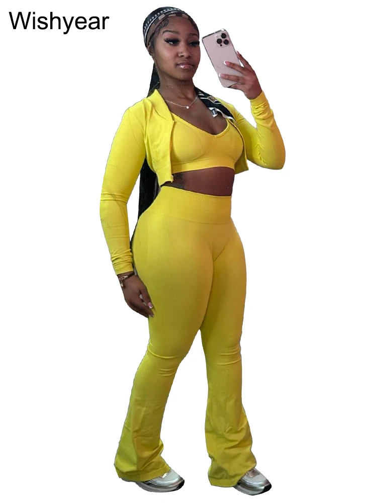 Chic Three-Piece Women's Activewear Set – Long Sleeve Crop Top, Tank, and Flare Pants