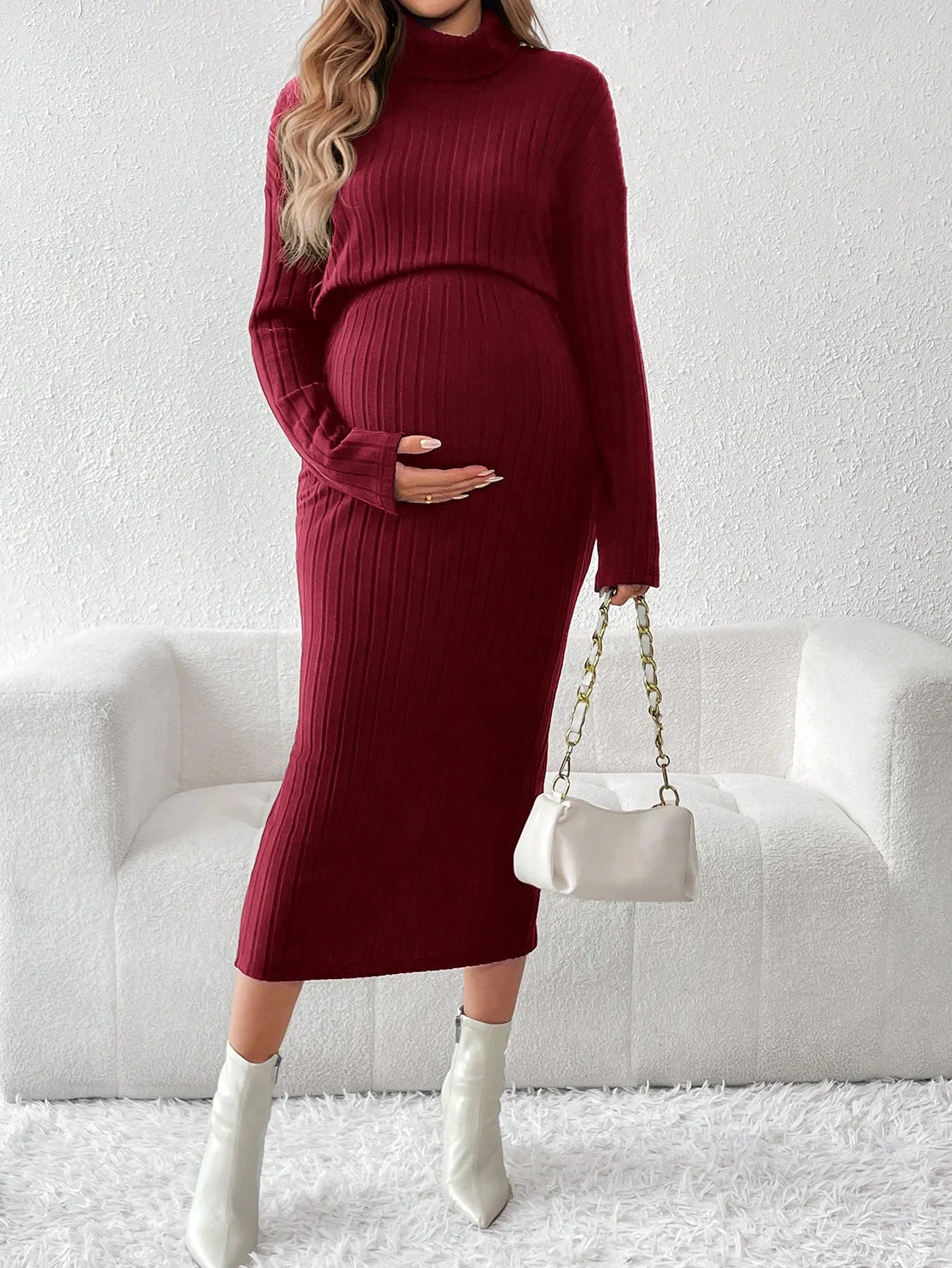 A two-piece set of high-waisted, solid-color knitted round-neck sweater for pregnant women
