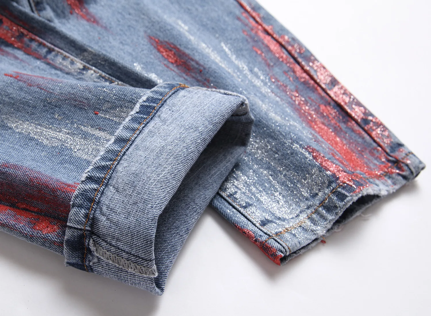 Europe and the United States paint slim-fit small straight leg jeans men hand-painted blue  feet long pants ripped 