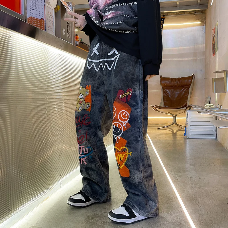 American Style Teen Pants High Street Ins Trendy Hip Hop Graffiti Jeans Baggy Straight Trousers Men and Women Four Seasons baggy