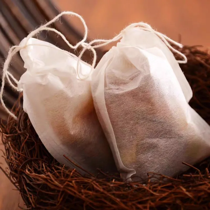 Description Picture 5 of itemDisposable Tea Filter Bags Wood Pulp Material Disposable Empty Loose Tea Infuser Sachets with Drawstring for Spice Coffee Herb