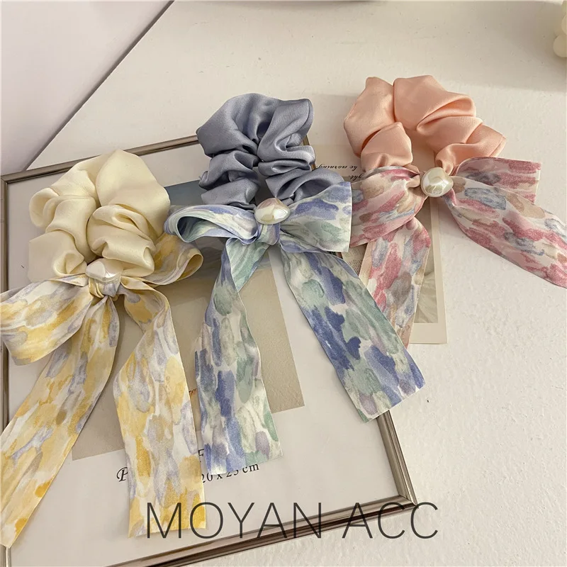 

Korean version of the high-end bow hairband female tied hair rope hairrope headdress ponytail streamer large intestine hair ring