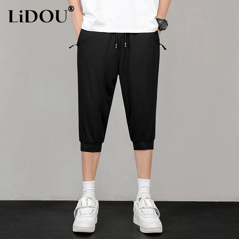 

Summer Solid Color Loose Casual Calf Length Pants 2023 Man Fashion Elastic Waist Pockets Street Motion Thin Style Out Streetwear