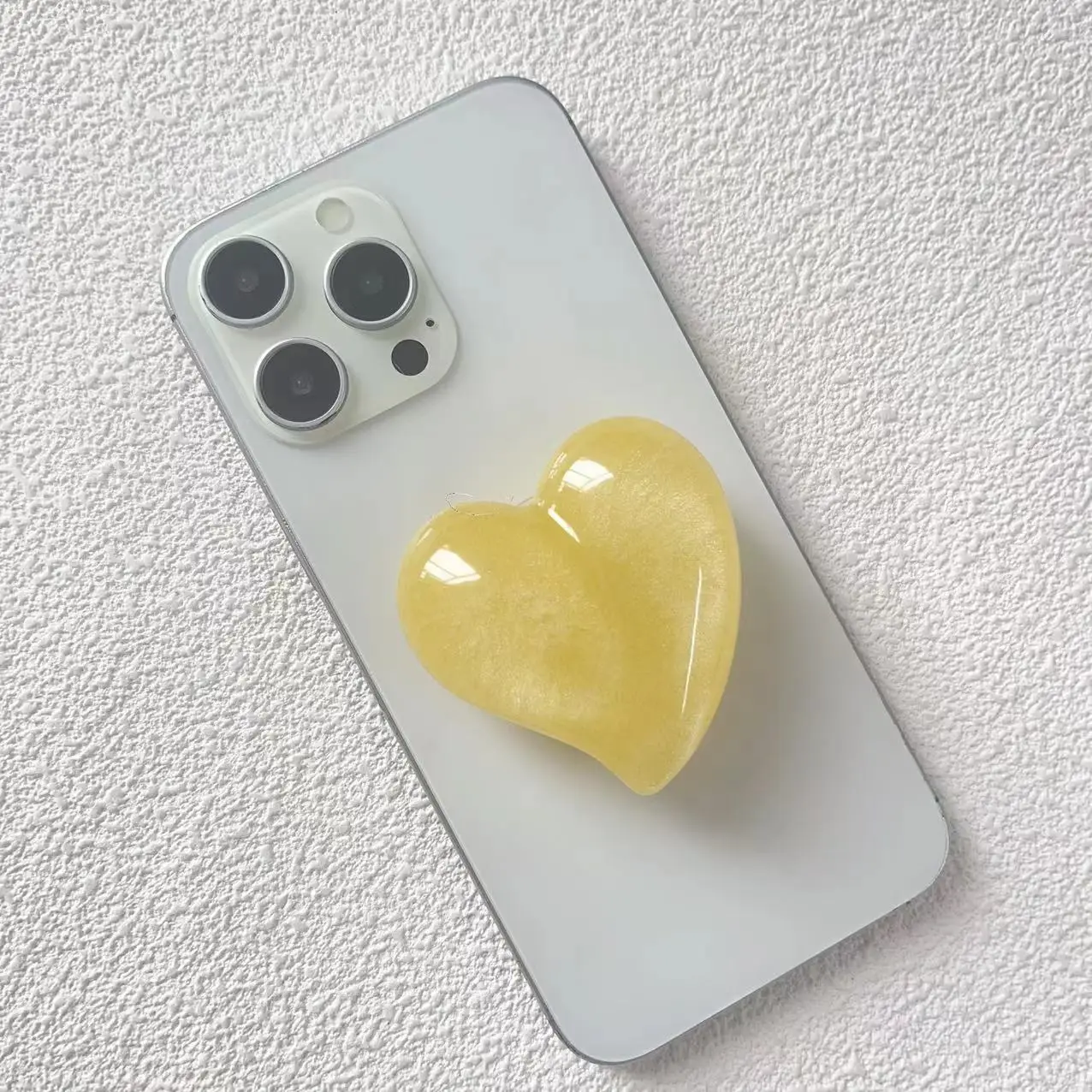 Support de téléphone pliable en résine en forme de cœur, couleur macaron, avec coussin d'air, pour iPhone 17 Samsung S26, support Grip Tok
