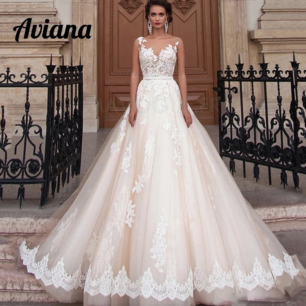 

Aviana Champagne Wedding Dresses Transparent Scoop Sash Lace Applique Sleeveless Bridal Gowns Backless A-Line vestido de novia