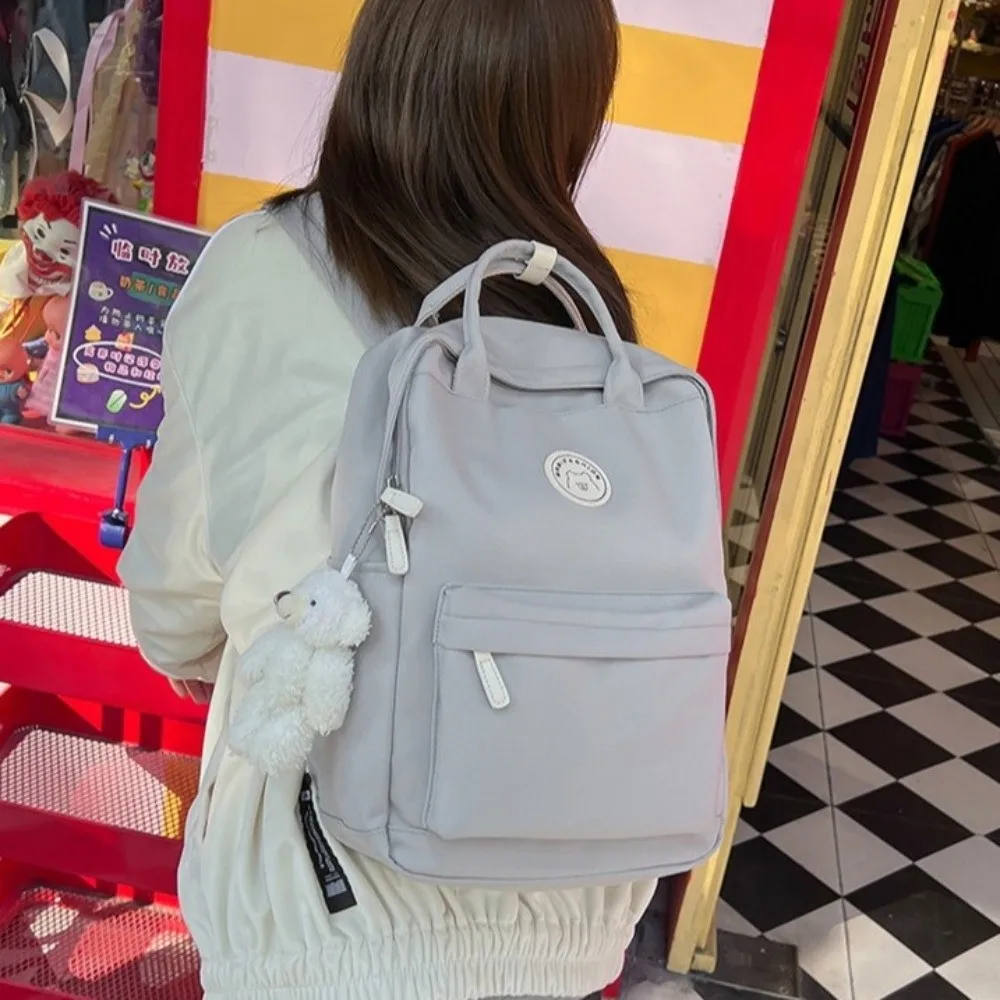 Solid Large Capacity Student Backpack Zipper Multi-Pocket Academy Girl's School Bag Spacious Nylon Plush Pendant Teens Rucksack 4