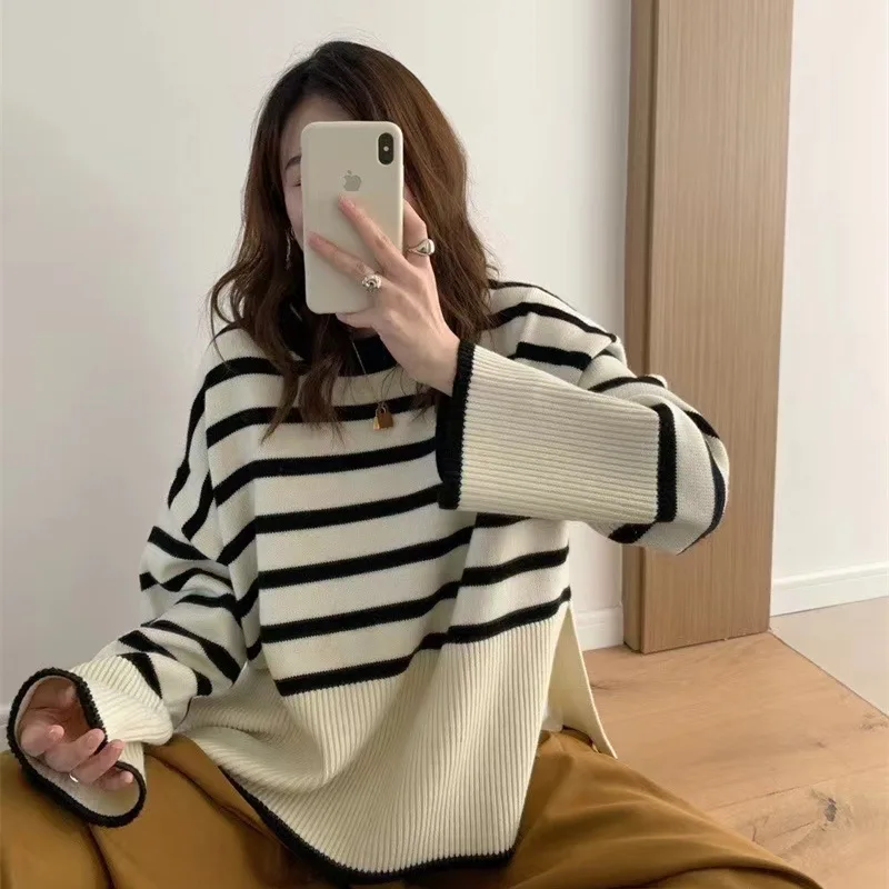 

Split striped sweater female design sense autumn new Korean version of lazy wind pullover sweater