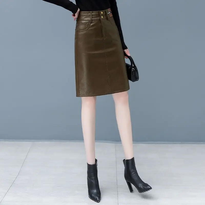 2023 Autumn New Women High-End Solid Color Pu Leather Skirt Female Temperament High Waist A- Line Sheath Casual One-Step Skirt design retro irregular high waisted fishbone skirt early autumn new skirt female 2021 autumn new black skirt casual button