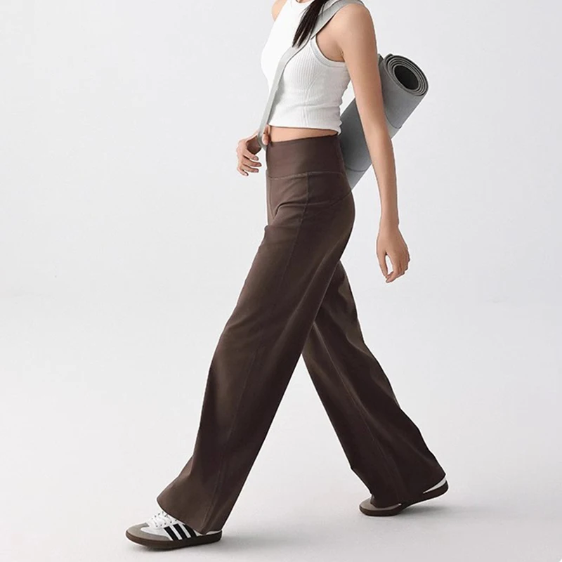 Pantaloni da donna di alta qualità con tasche Pantaloni sportivi larghi elasticizzati a vita alta Pantaloni da allenamento per yoga per il tempo libero e sport Nake-Feeling - immagine 4