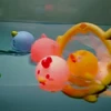 LED Light Up Toys Baby Cute Animals Bath Toy Swimming Water Soft Rubber Float Induction Luminous Duck for Kids Play Funny Gifts 4