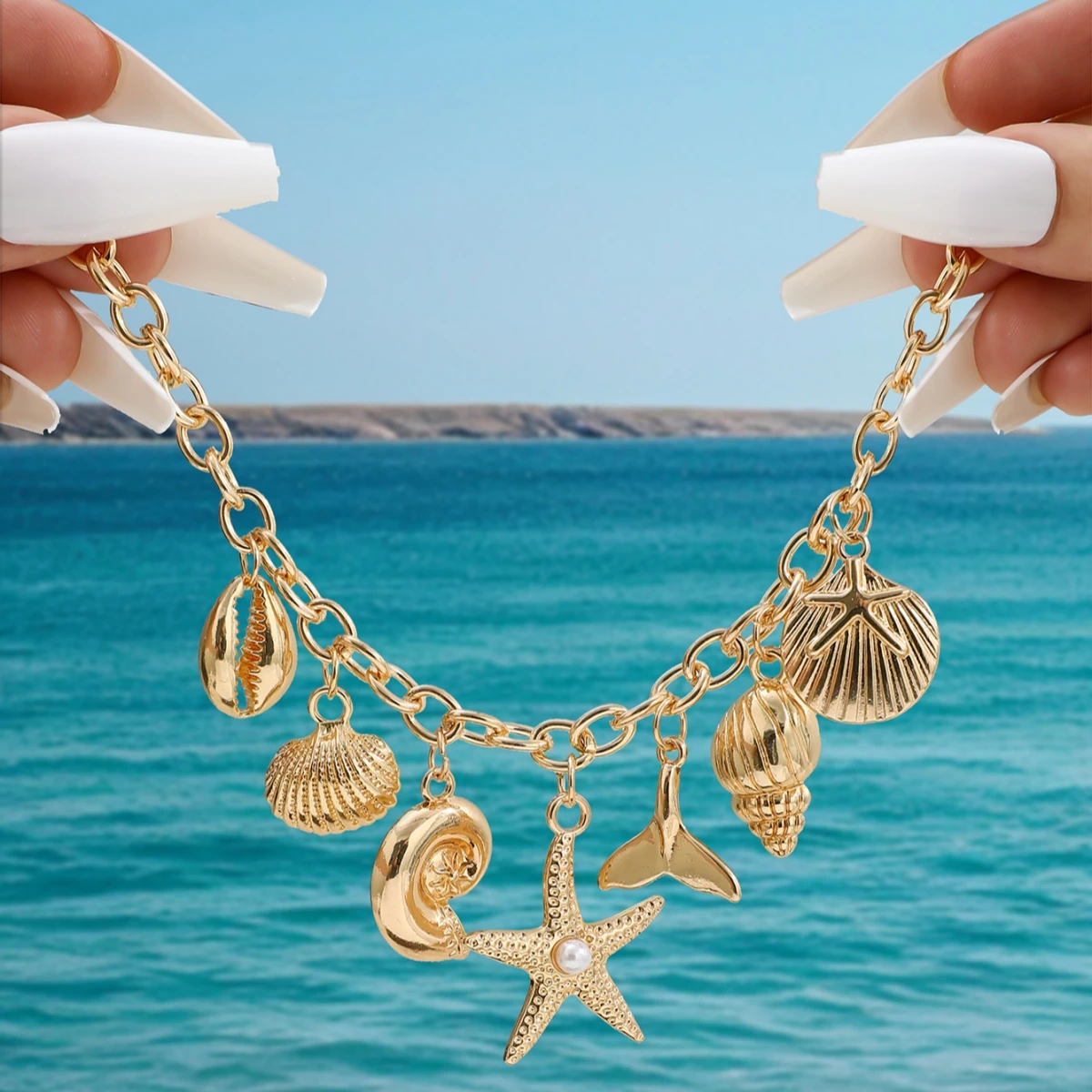 Pulseira boho de praia com berloques de estrela e conchas_voghion.com