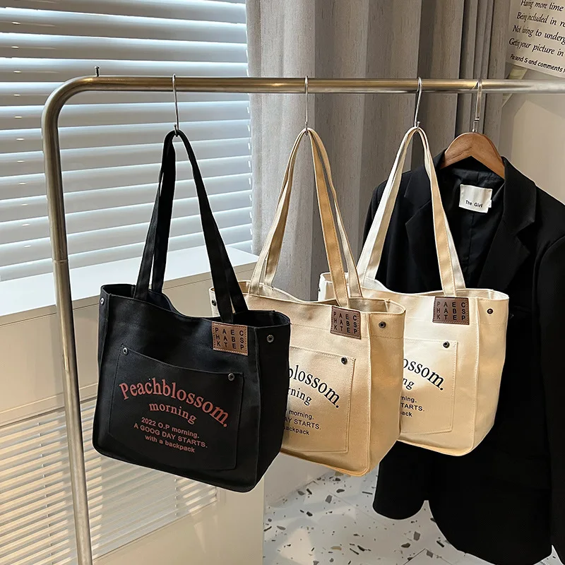 

Canvas Shopping Bag Woman Bag Letter Reusable Shoulder Bag Girls School Harajuku Commuter Simple Large Capacity Fashion Tote Bag