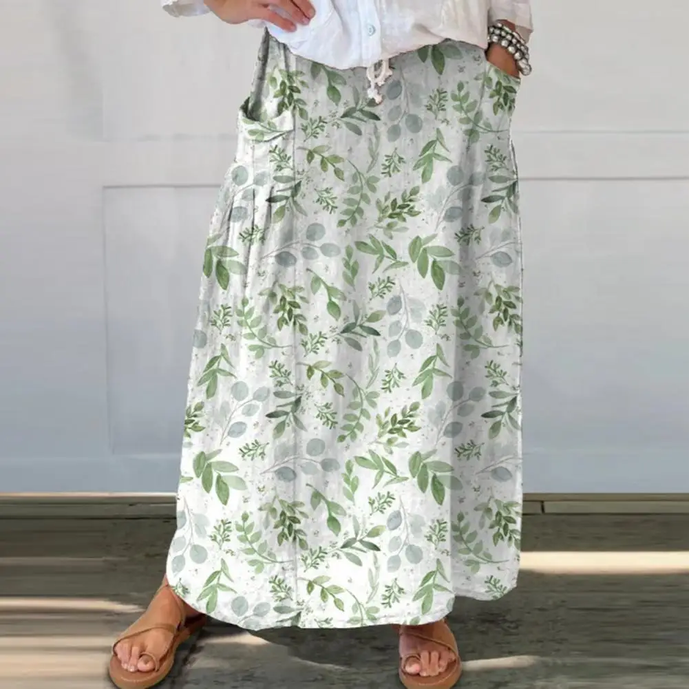

Женская юбка макси в богемном стиле, свободная юбка трапециевидной формы с эластичной талией, цветочным принтом и листьями, с карманами, для пляжа или на каждый день