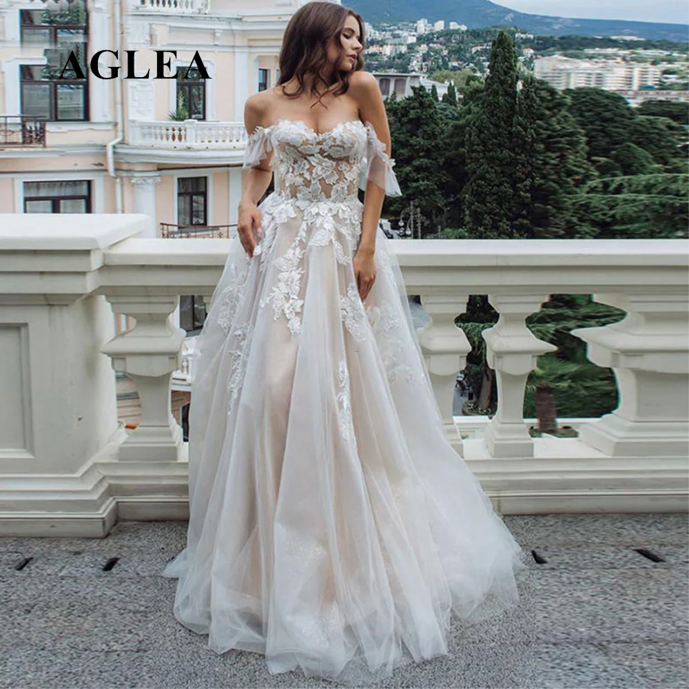 

Sexy Sweetheart A Line Wedding Dresses Off Shoulder Champagne Liner Tulle Appliques Sleeveless Bridal Gowns Womens Formal 2022