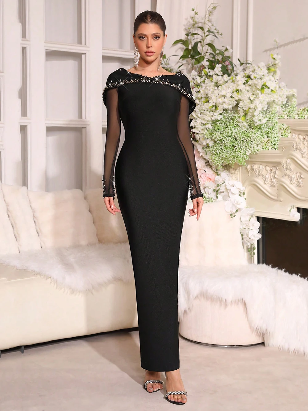 Beaded embellishment and cape detail