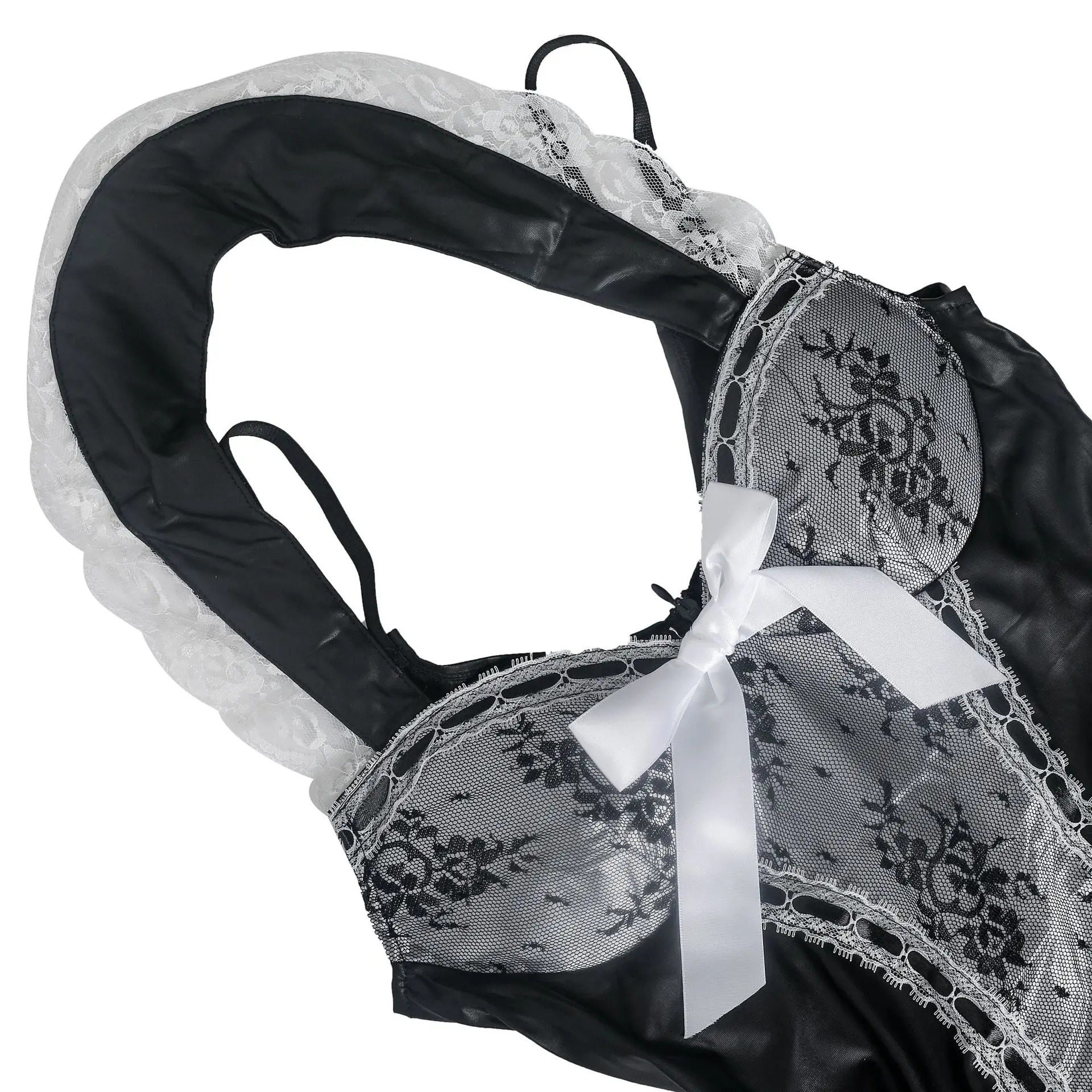 Close-up of lace trim on the skirt with black and white costume contrast