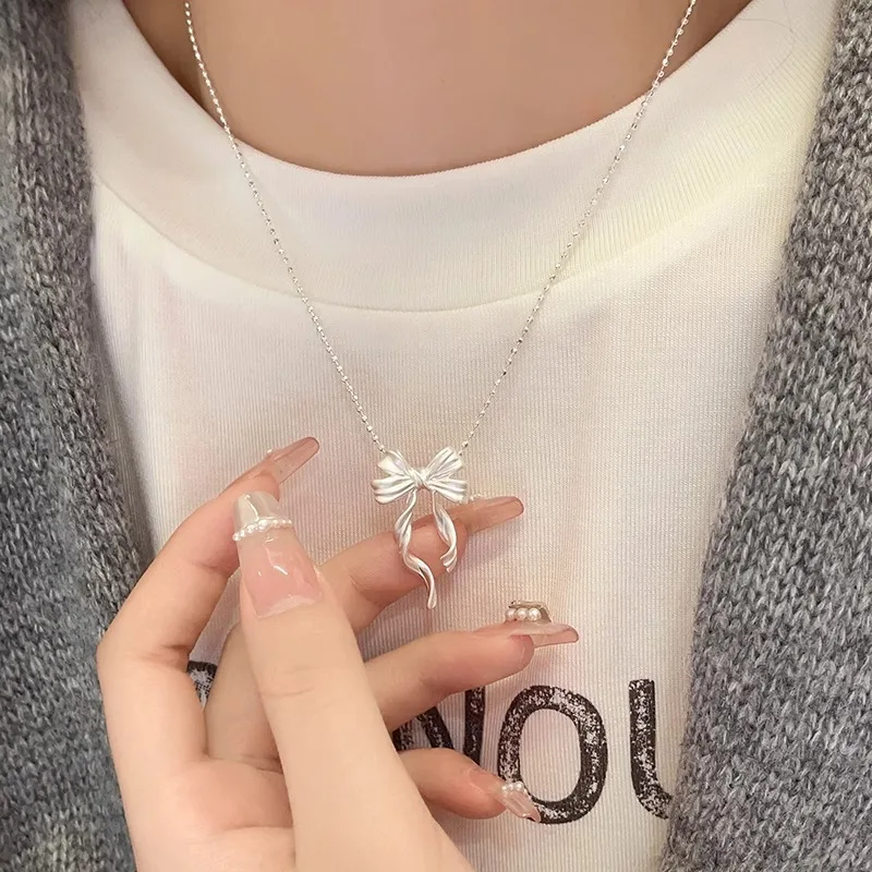 2025 New Trendy Silver Color Bow Pendant Necklace For Woman