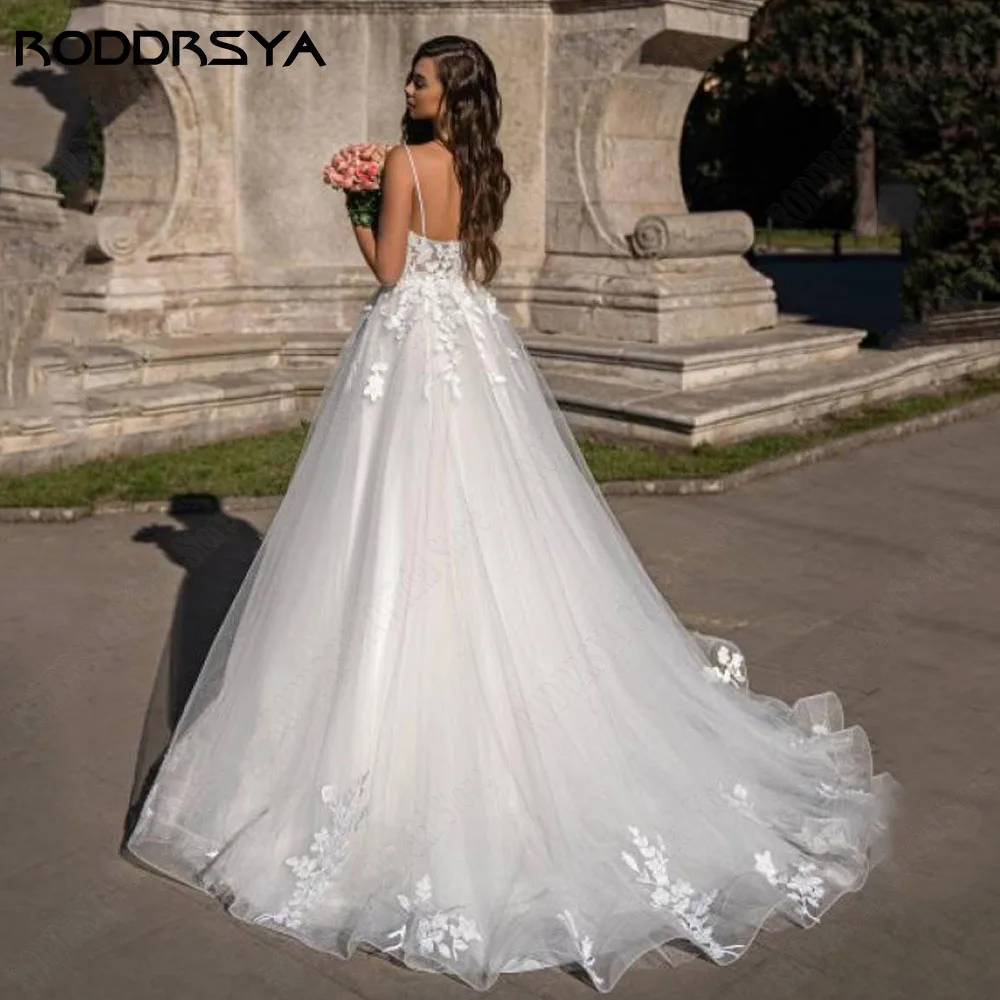 

RODDRSYA Boho Glitter Wedding Dress Backless A-Line Applique Spaghetti Strap Vestido De Novia V-Neck Tulle Bride Dress Plus Size