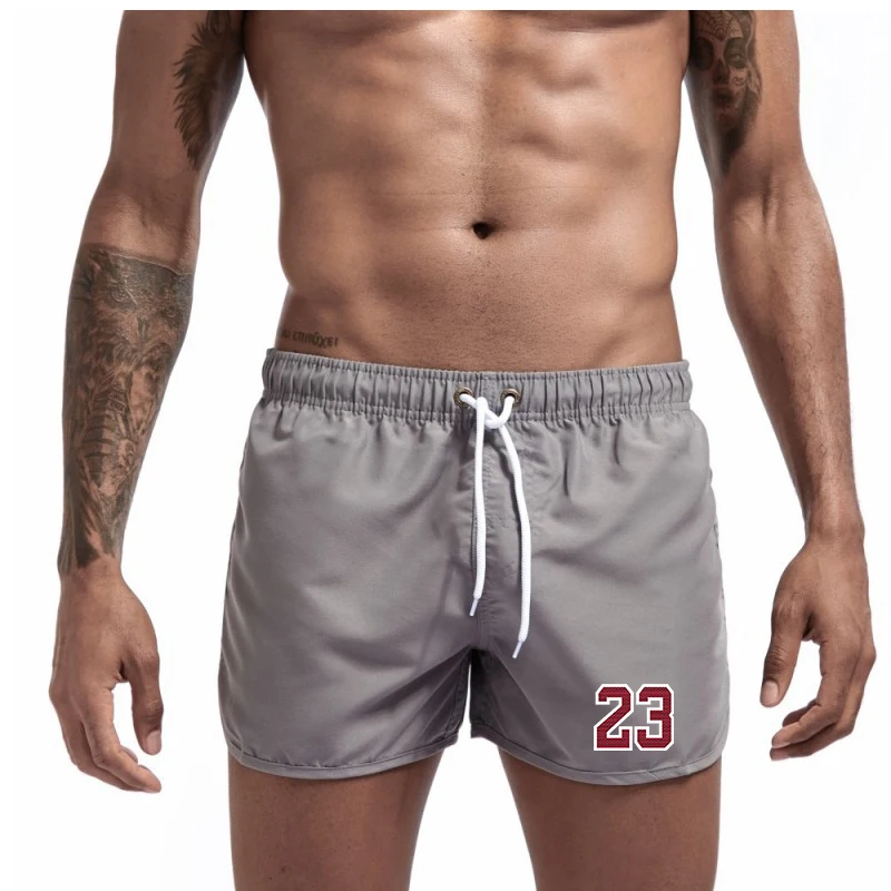 

2023 Men's Swimming Shorts Summer Board Surfing Sexy Low Waist Beachwear Swimming Trunks Seaside Surfing Male Shorts masculinos