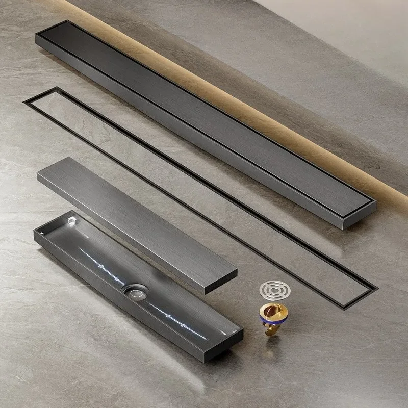 304 ปืนสแตนเลสสีเทาท่อระบายน้ําชั้นที่ซ่อนอยู่พร้อมการระบายน้ําลาดท่อระบายน้ําชั้นสี่เหลี่ยมที่มองไม่เห็นแถบยาวป้องกันกลิ่น 1