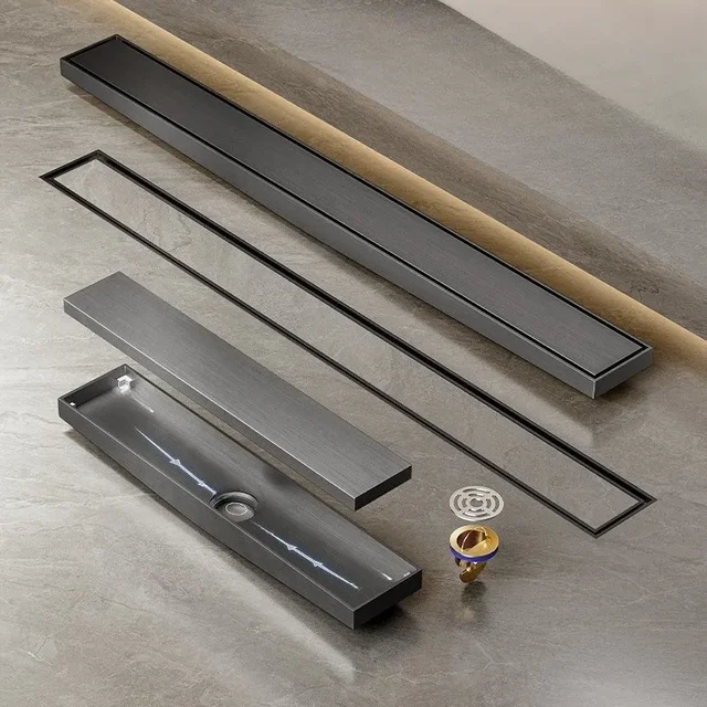 304 ปืนสแตนเลสสีเทาท่อระบายน้ําชั้นที่ซ่อนอยู่พร้อมการระบายน้ําลาดท่อระบายน้ําชั้นสี่เหลี่ยมที่มองไม่เห็นแถบยาวป้องกันกลิ่น 1