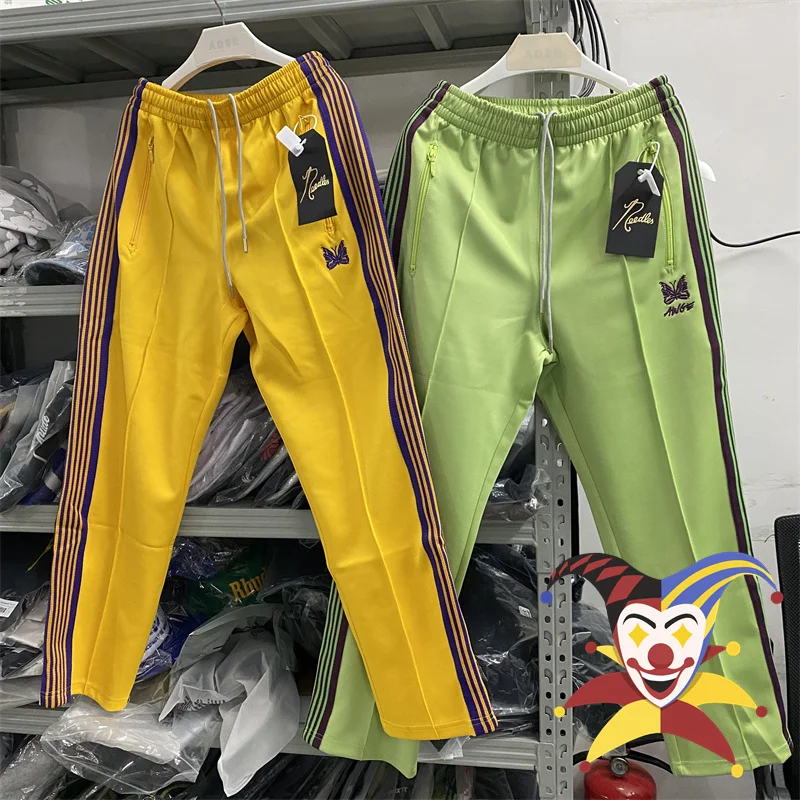 

Yellow Green Stripes Needles Sweatpants Men Women Poly Smooth Track Pants Butterfly Embroidery Trousers