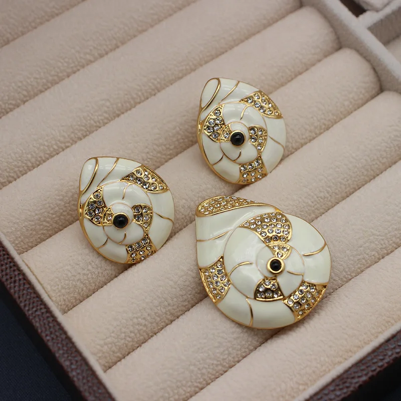 Vintage white enamel French romantic brooches and earrings popular in Europe and America