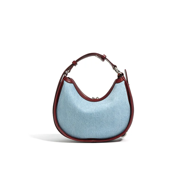 Half moon shoulder bag made of denim with genuine leather trim – casual and stylish design for daily use.