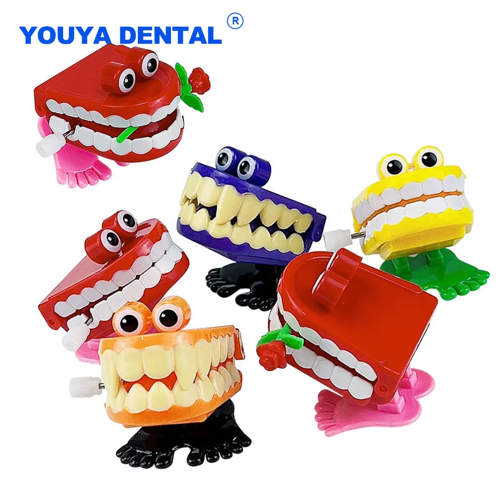 

1Pcs Jumping Teeth Shape Doll Clockwork Toy Cute Walking Upper Chain Wind Up Toys For Kids Educational Dental Dentist Gifts