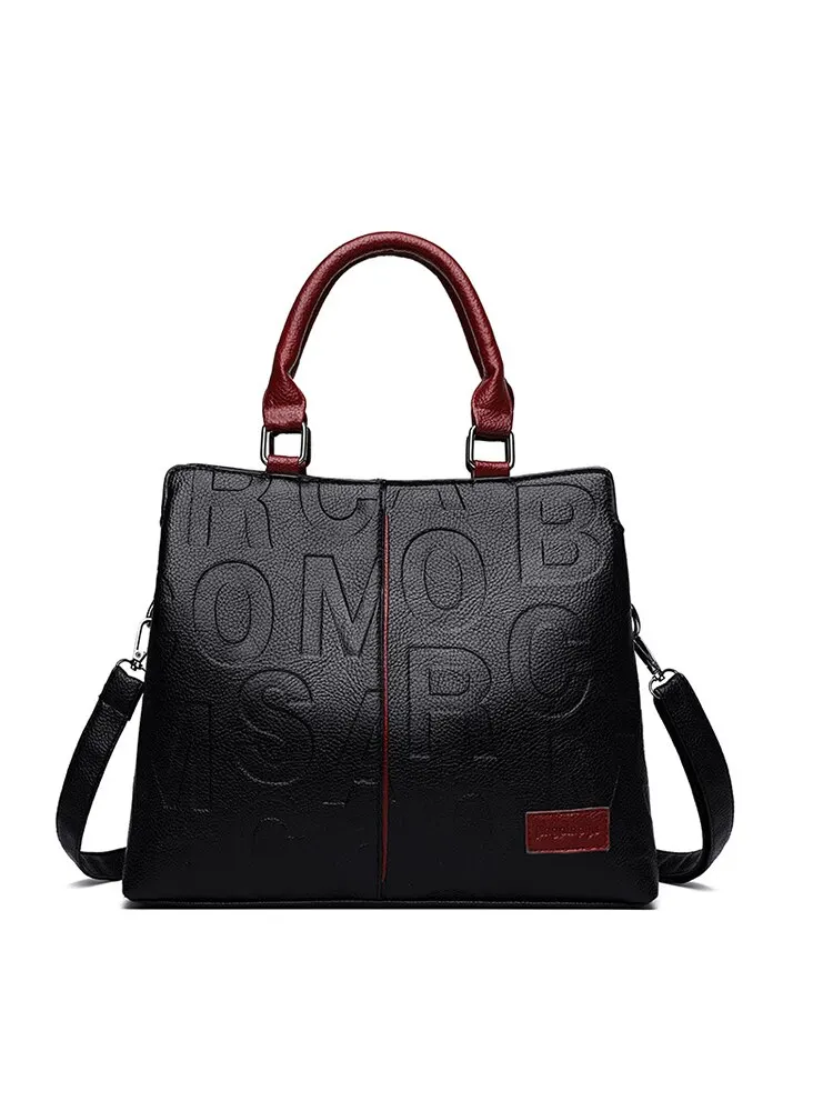 2023 New Fashion Solid Color Shoulder Large Capacity Soft Leather Cloth Letter Emed Ladies Handbag_voghion.com