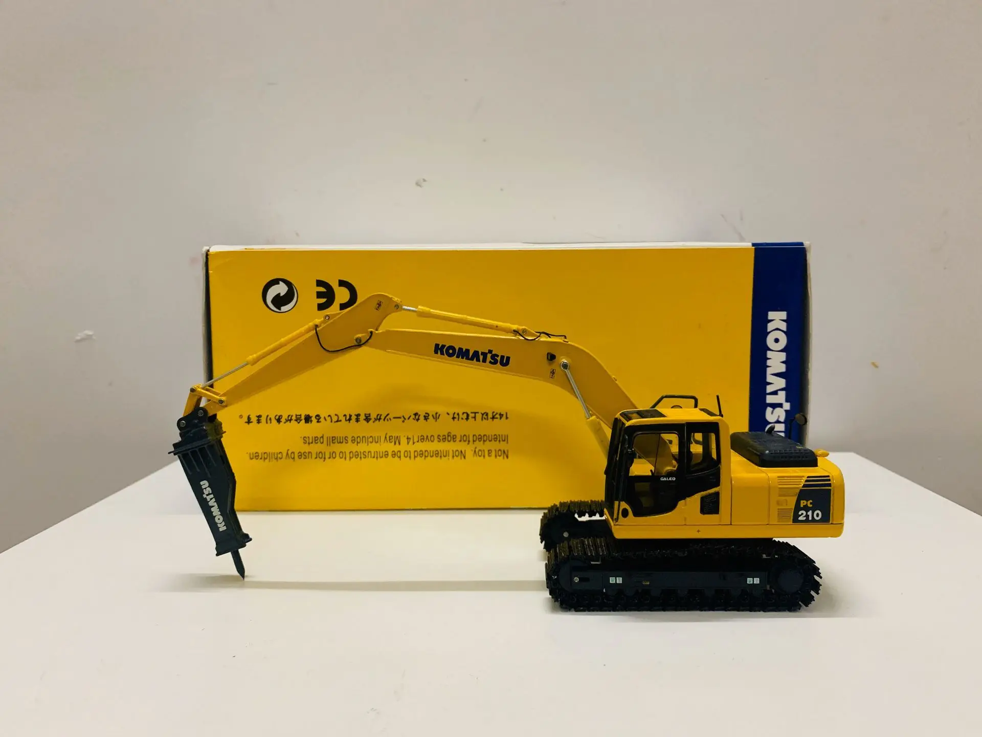 

Komatsu PC210 Hammer Drill Excavator 1/50 Scale Die-Cast New in Original Box