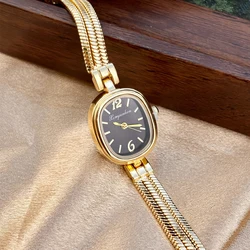 Elegant Gold Ladies' Watch with Oval Bead Face and Fringe Tassel Band (Golden black)