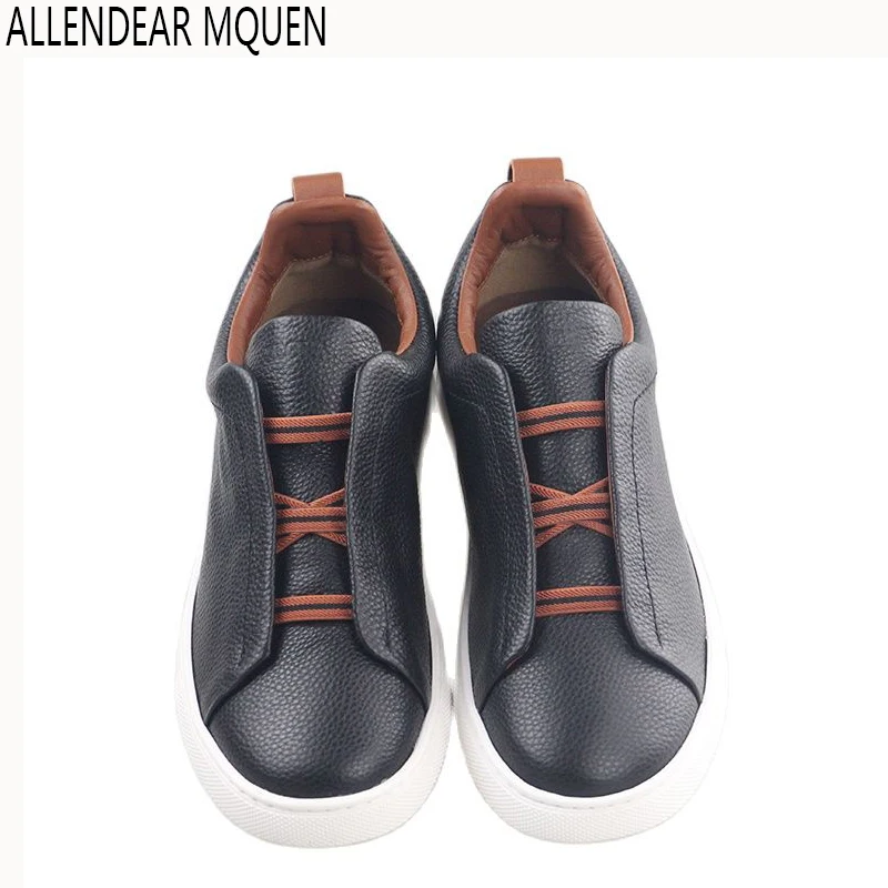 

2023 new spring and summer leather round head flat men's casual shoes a slip-on fashion board shoes soft soled bean shoes