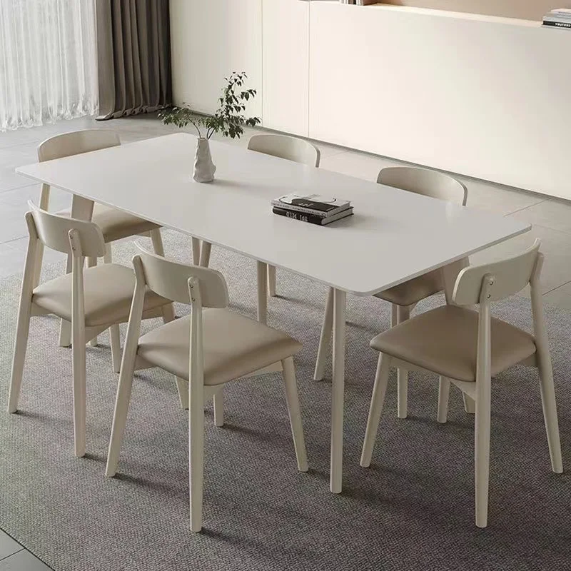 

Nordic pure white slate dining table online celebrity cream wind small apartment modern simple rectangular solid wood dining