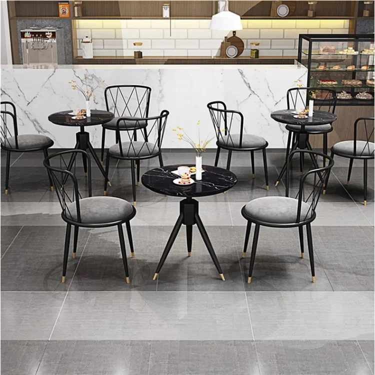pink velvet fabric chair with gold legs and round table with marble top coffee shop furniture chairs and tables