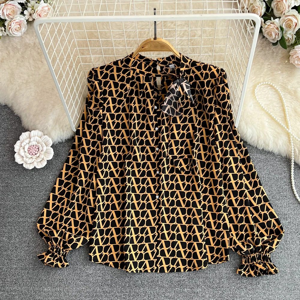 

Spring and Autumn New Korean Version of the Bubble Long-sleeved Loose Single-breasted Printed Chiffon Shirt