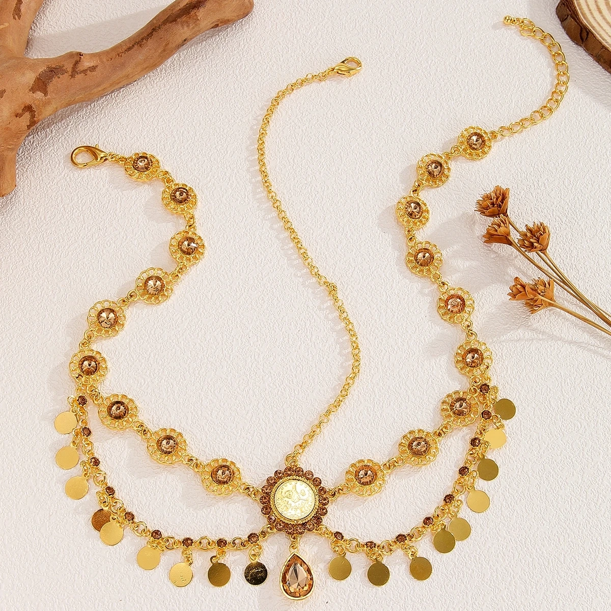 تاج الجبين الملكي بحجر كريستالي وعملات ذهبية