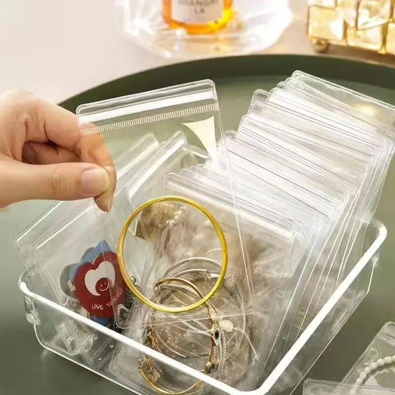 Jewelry Packaging Bags 50/100pcs Thicken PVC Jewelry Package Bags Transparent Anti-Oxidation Organizer Display Packaging Storage Self Sealing Pouches
