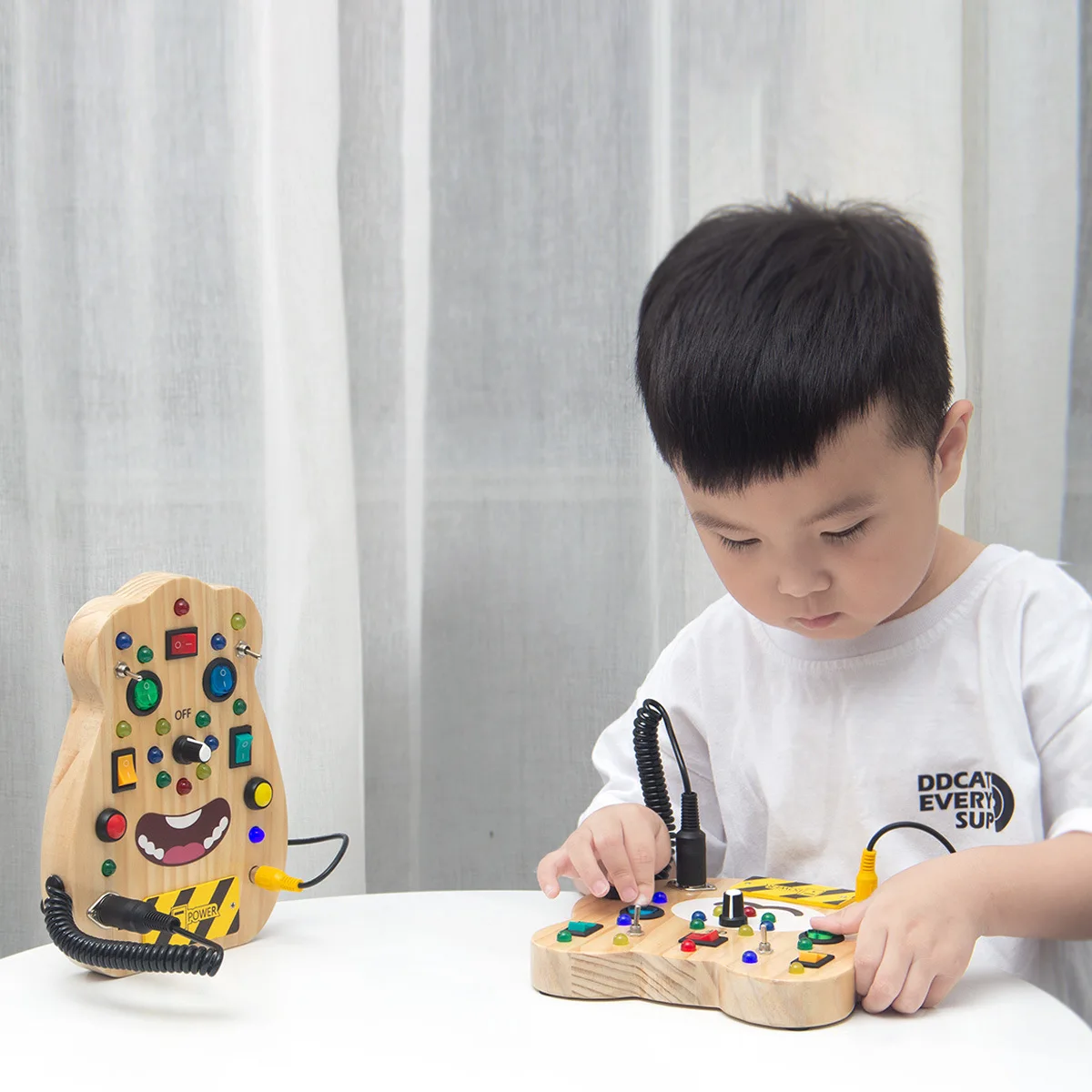 https://ae01.alicdn.com/kf/S6c965fa56ffb412495226dfc6e6ba96cu/Kids-Busy-Board-Montessori-Toys-Toddler-Sensory-Activity-Play-Board-Baby-Switch-Plug-Socket-Light-Part.jpg