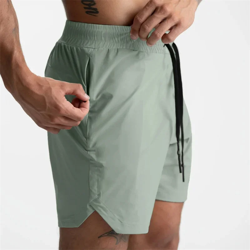 Men Running Bodybuilding Shorts Man Summer Gyms Workout shorts Male Breathable Quick Dry Sportswear Jogger multi-pocket Shorts 2