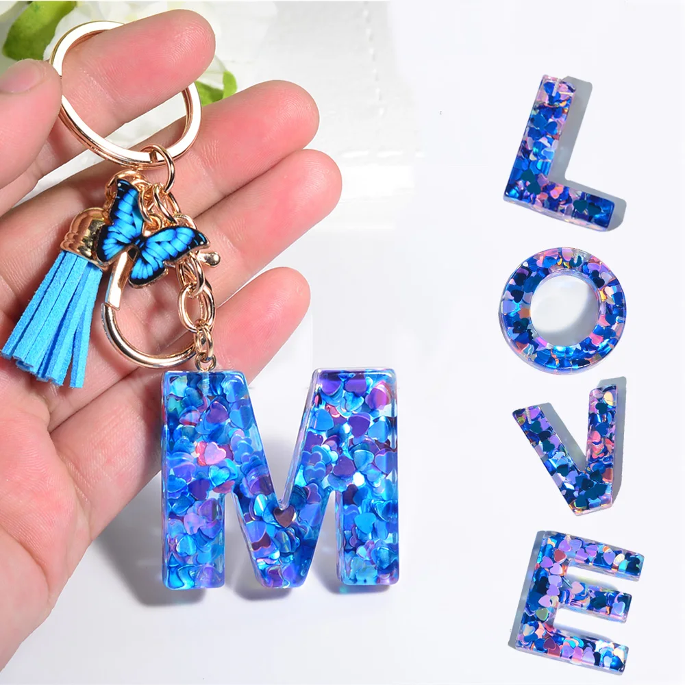 

Fashion 26 Letter Acrylic Keychain With Blue Butterfly Pendant Heart Sequin Filled Tassel A-Z Initials Keyring Bag Ornament Gift